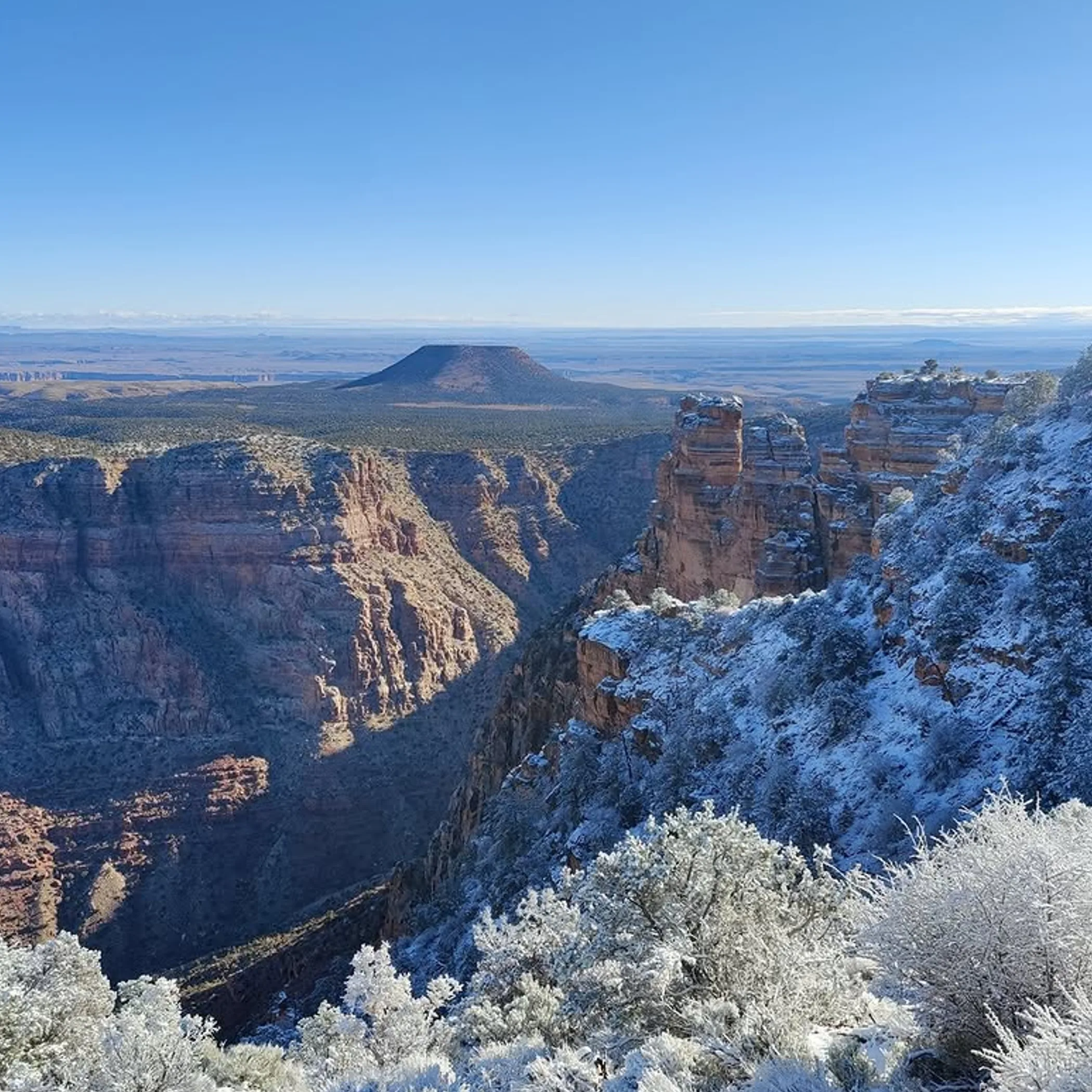 desert viewpoint with snow and clear sky