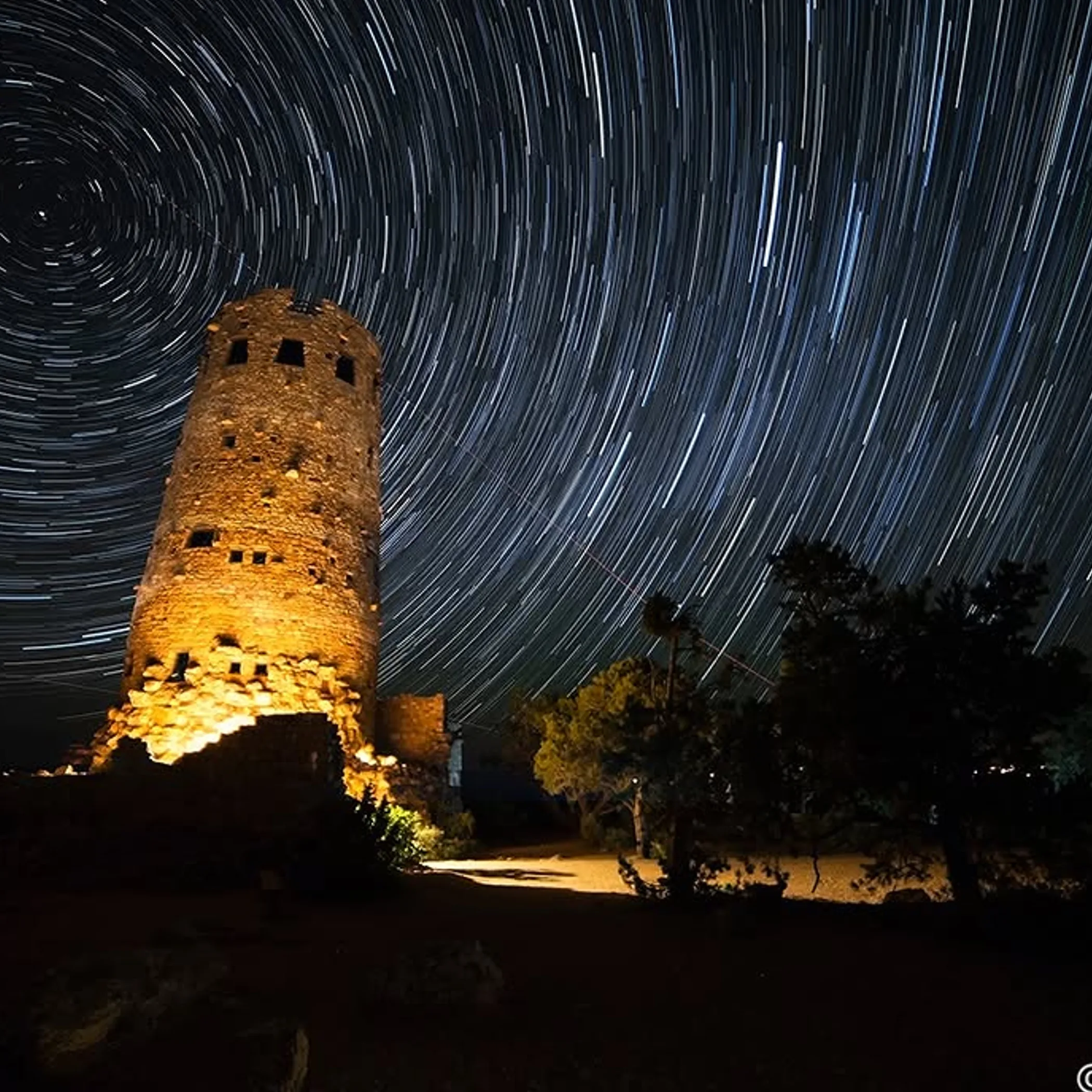 desert view watch tower with star trails